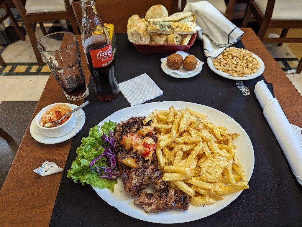 Argentine steak with lots of sides